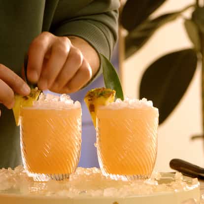 Two Absolut Bird cocktails, a vodka version of the Jungle Bird cocktail
